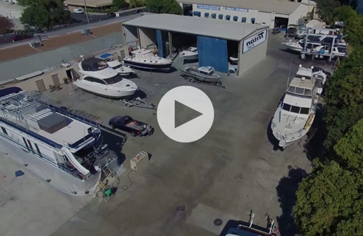 A thumbnail for a video of drone footage over the boatyard at Delta Marine Sales